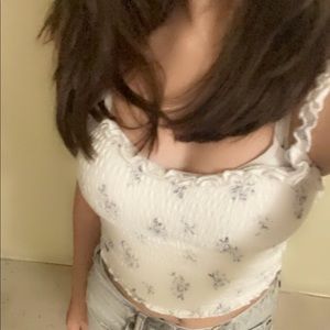 This cop top is very unique it is white and blue and  from Hollister